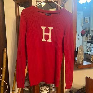 . Red sweater with a white H  Sweater, Size M